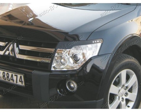 Реснички на фары Mitsubishi Pajero 4 06- (Spirit)