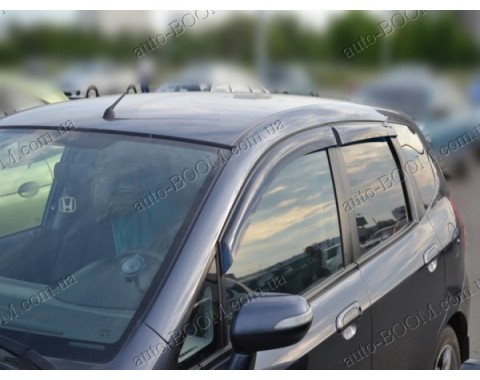 Дефлекторы окон на Honda Jazz 2 08- (Cobra Tuning)