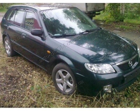 Дефлекторы окон на Mazda 323 98-03 (Cobra Tuning)