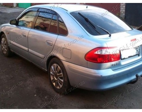 Дефлекторы окон на Mazda 626 97-02 (Cobra Tuning)