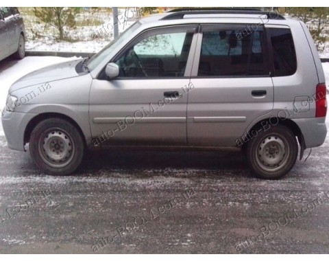 Дефлекторы окон на Mazda Demio 97-03 (Cobra Tuning)