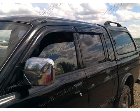 Дефлекторы окон на Mitsubishi L200 96-06 (Cobra Tuning)