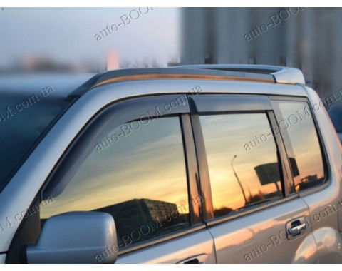 Дефлекторы окон на Nissan X-Trail 00-08 (Cobra Tuning)